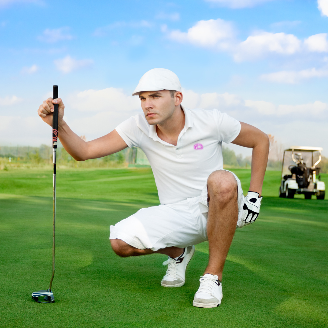 A golfer wearing the Pink Taco Golf Shirt